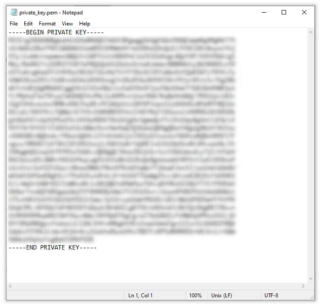 A blurred text document displaying a private key with beginning and ending markers.
